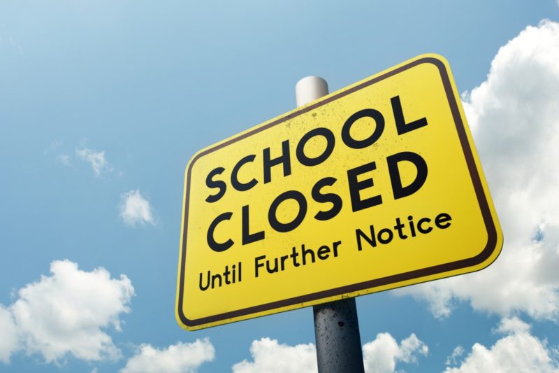 Sign: "School closed until further notice"