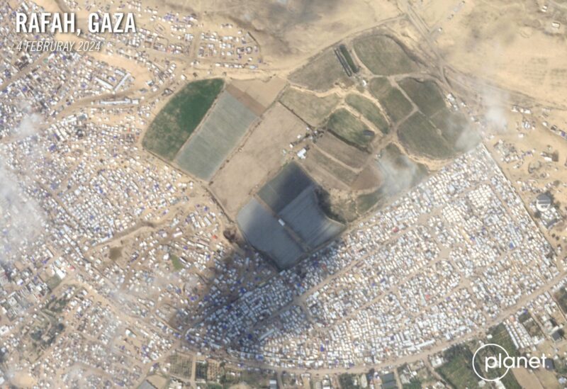 A satellite image of rural areas of Rafah shows a mass of tents and temporary structures. Credit: Planet Labs