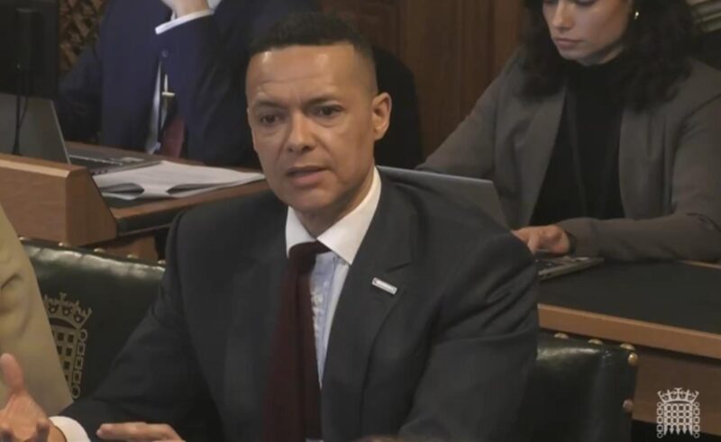 A picture of Clive Lewis asking a question at today