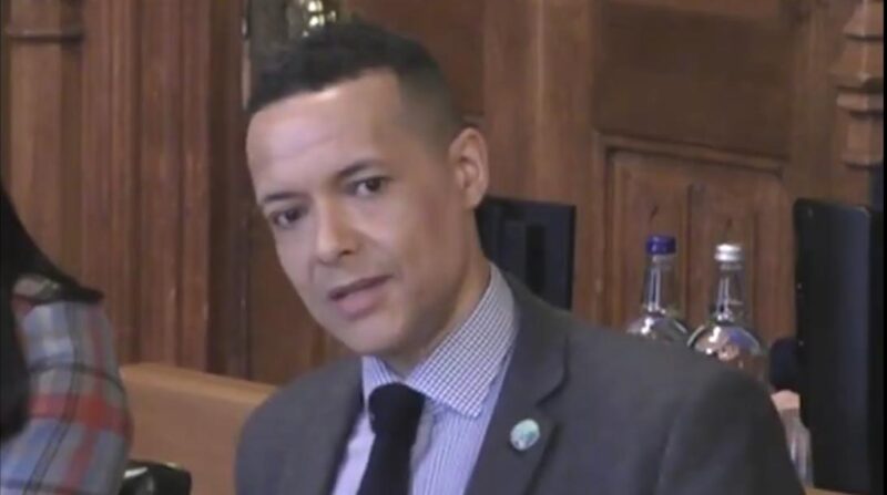 An image of Clive Lewis MP asking a question at the Environmental Audit Committee