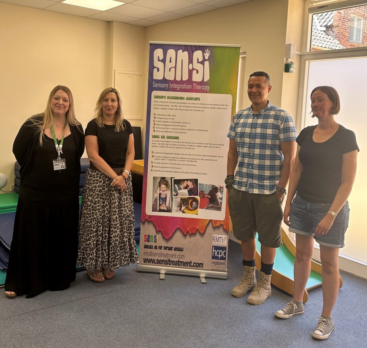Clive Lewis MP visits SENSI, pictured with staff and parents
